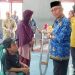 Wabup Iwan Adam Serahkan Bantuan Atensi untuk 72 Warga Pohuwato